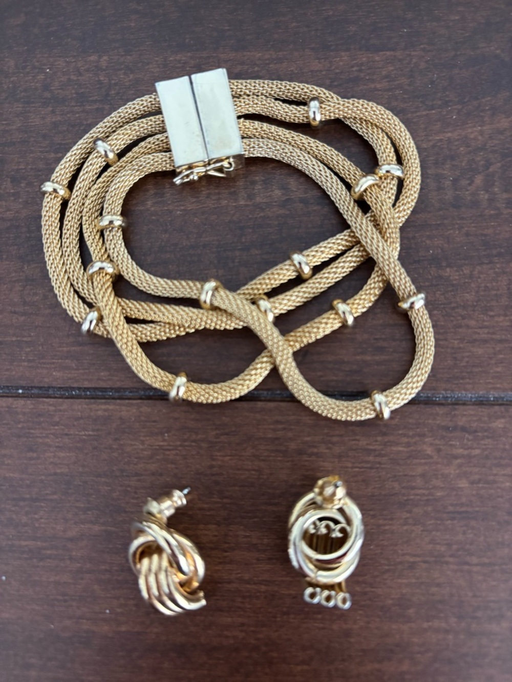 Gold tone bracelet and earrings